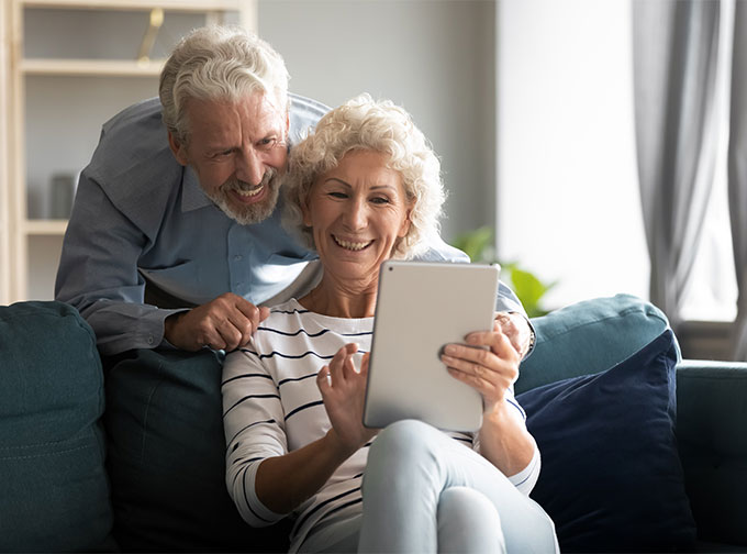 older couple reviewing retirement documents