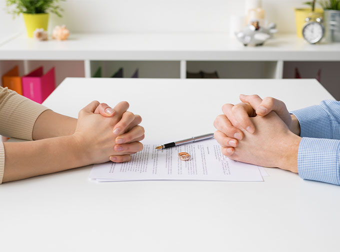 divorced couple updating retirement paperwork